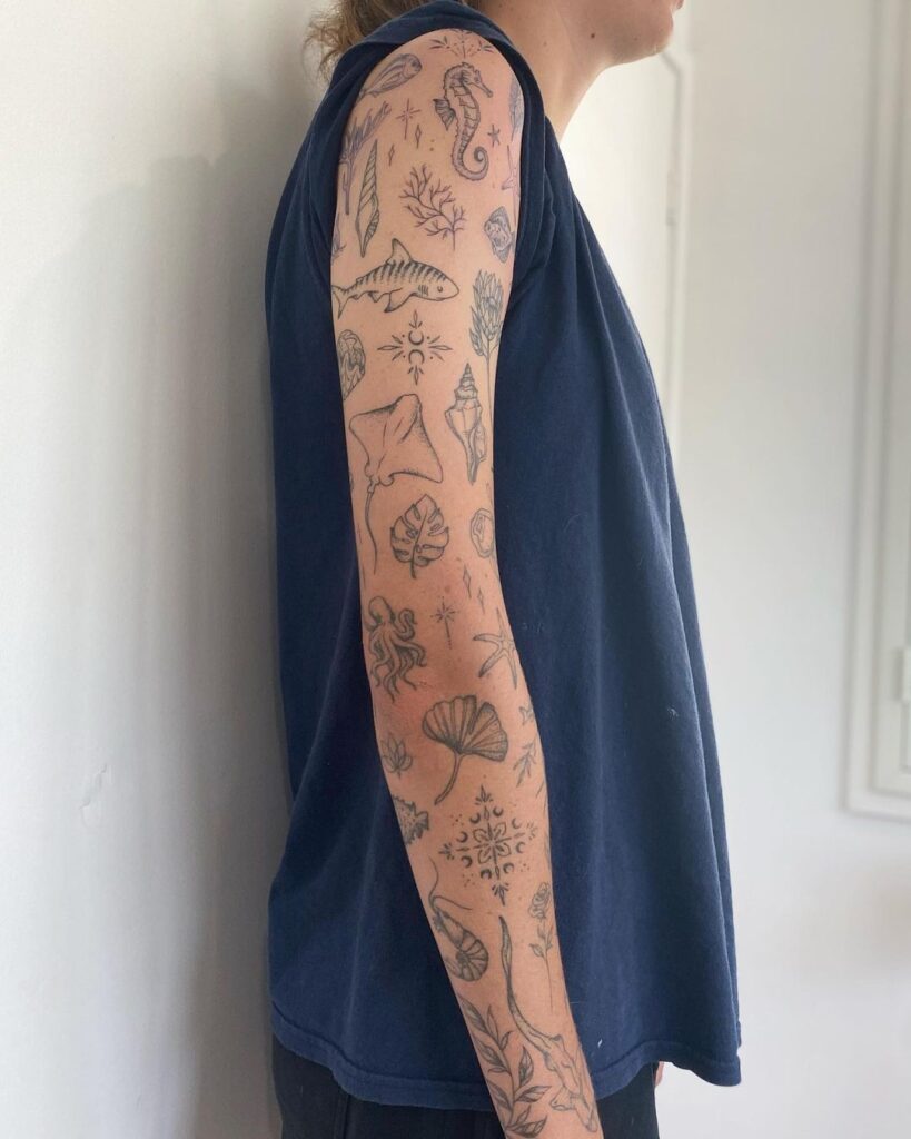 Tatuaje de manga de líneas finas Sea Patchwork