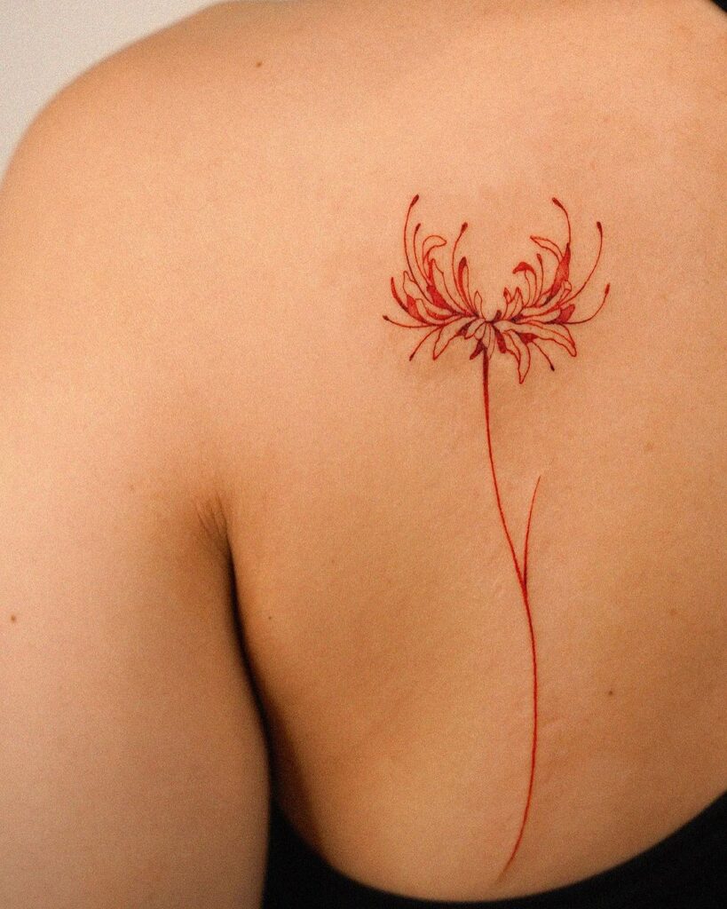 Tatuagem simples de lírio-aranha vermelho