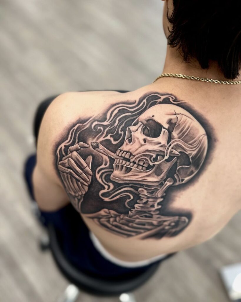 Skeleton Smoking Back Tattoo