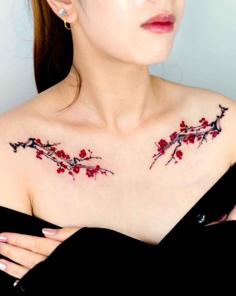 Tatuagem simétrica de flor de cerejeira