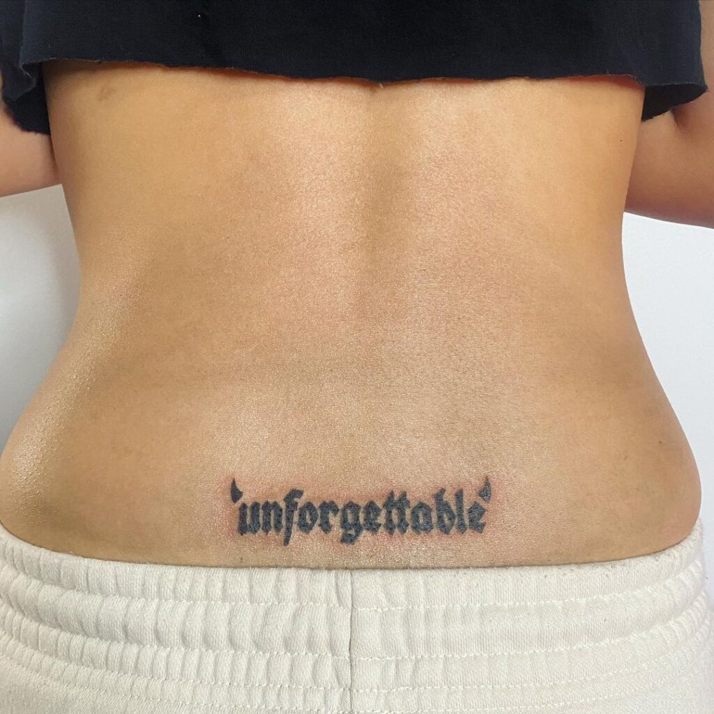 Unforgettable Script Tat With Horns