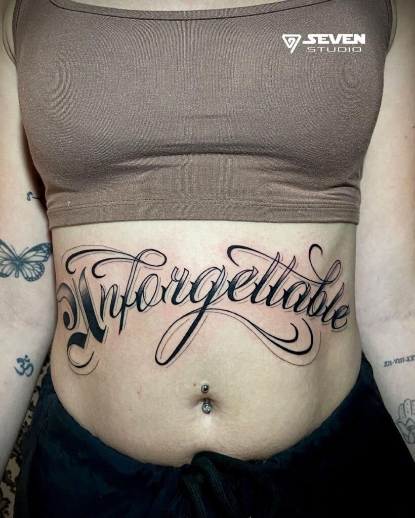 Unforgettable Stomach Lettering Tattoo