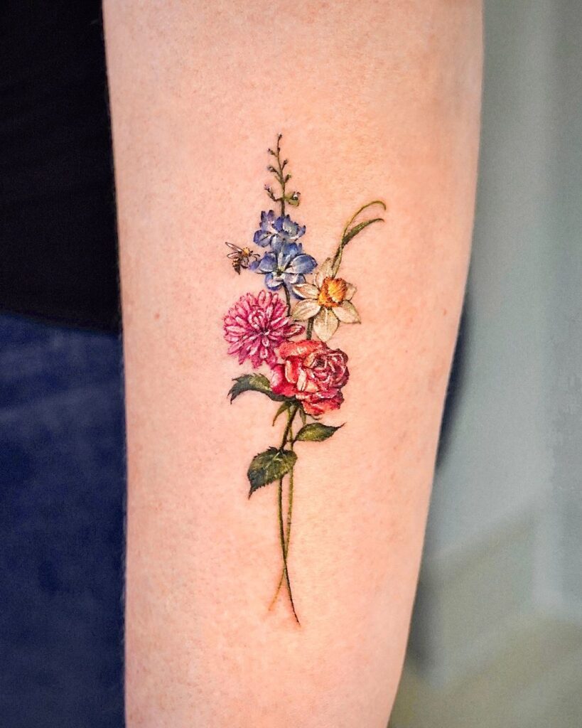 Birth Flowers Arm Tattoo