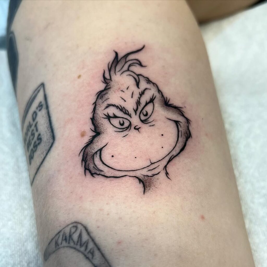 Tatuaggio Grinch a inchiostro nero