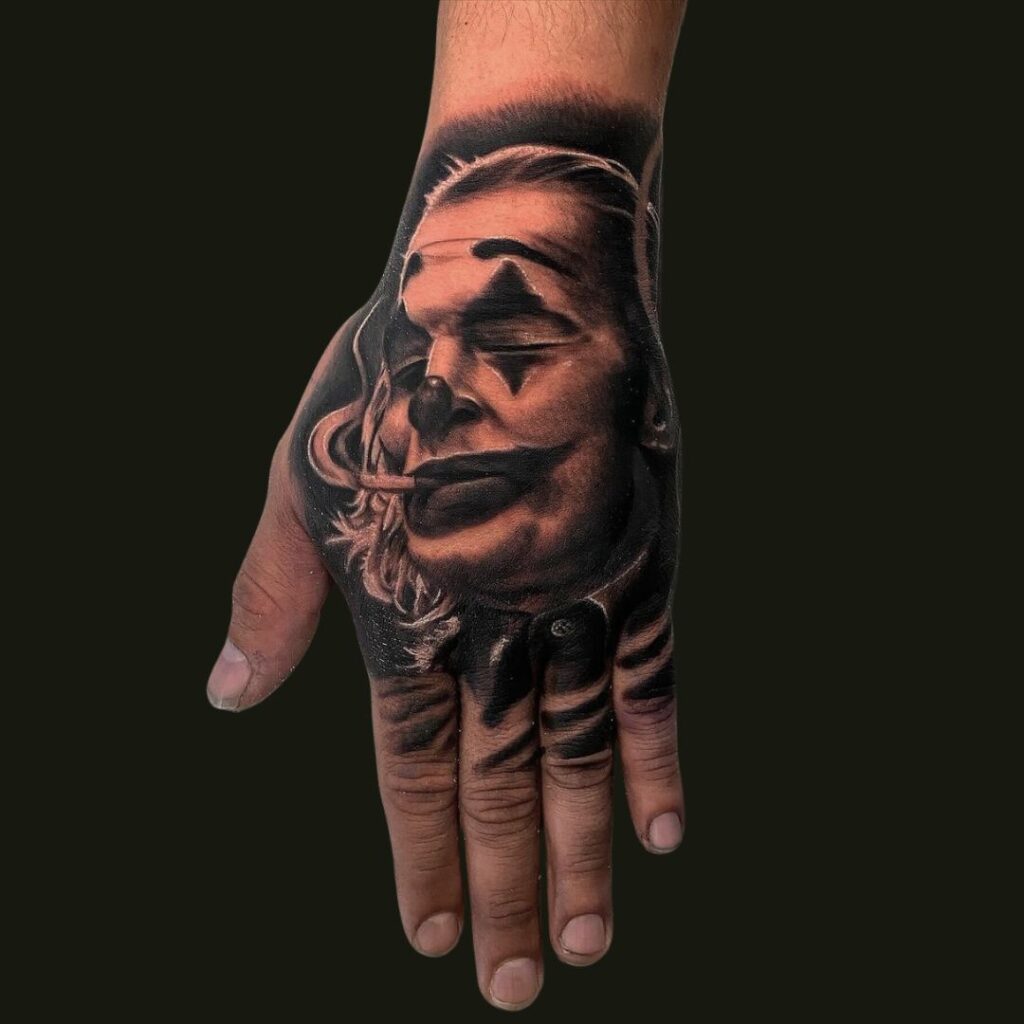 Bold Joker Hand Tattoo