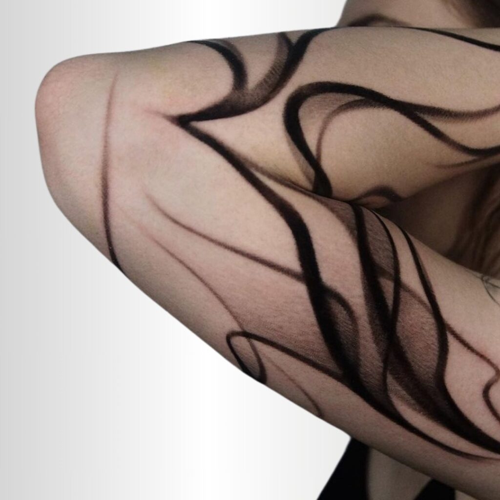 Brushstroke Flow Tattoo