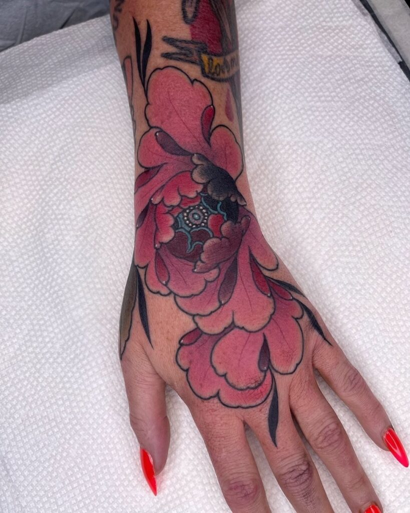 Colorful Flower Hand Tattoo