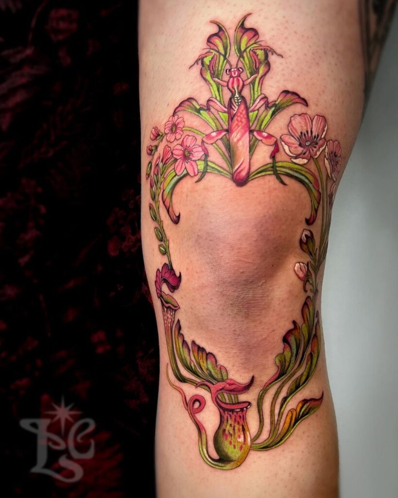 Tatuaggio del ginocchio con cornice floreale