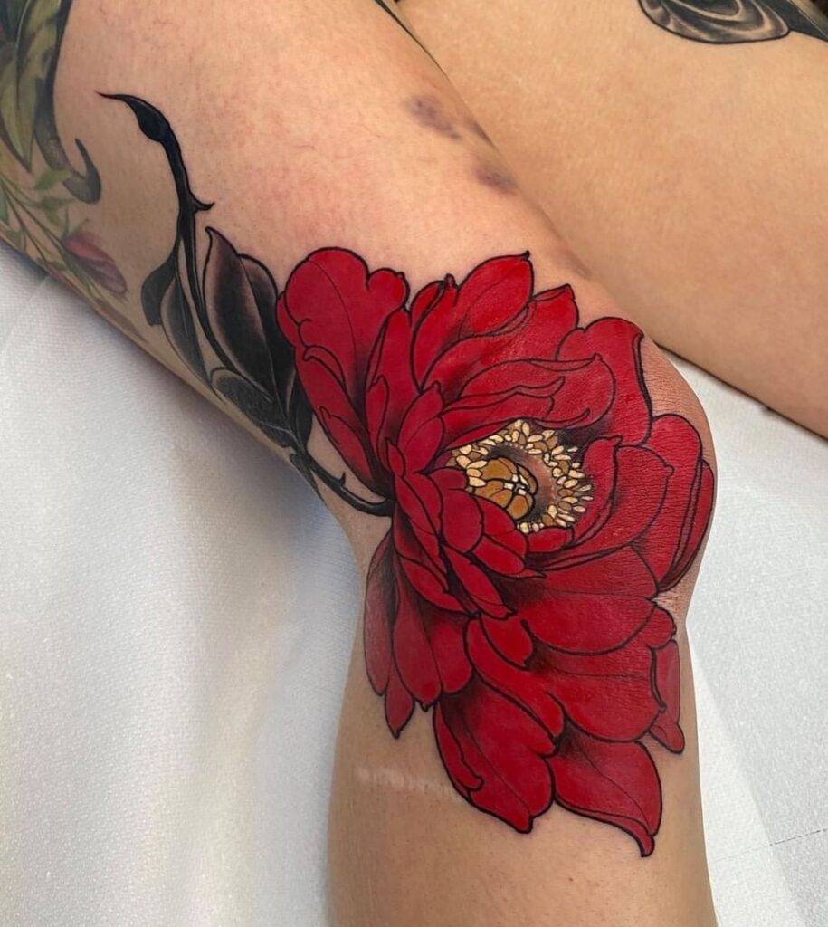 Tatuaggio del ginocchio con fiori