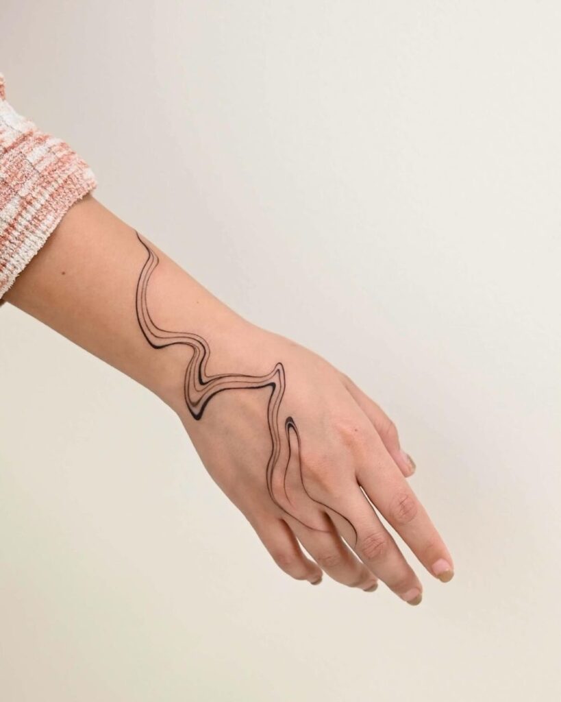 Hand Flow Tattoo