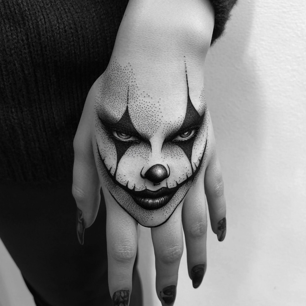 Joker Face Hand Tattoo