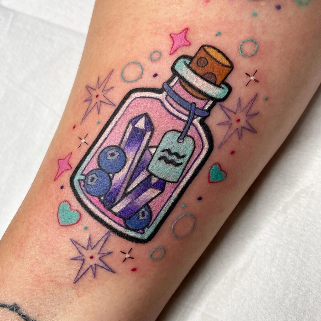 Playful And Sweet Aqua Tofana Tattoo