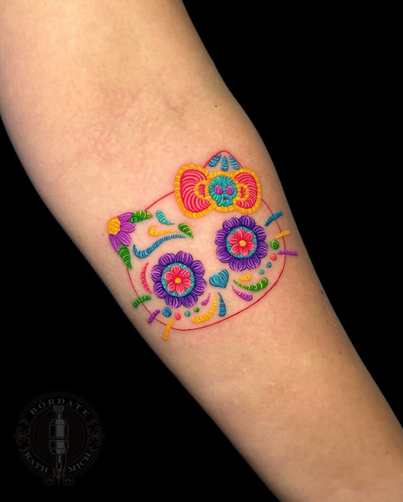 Tatuagem pequena da Hello Kitty mexicana