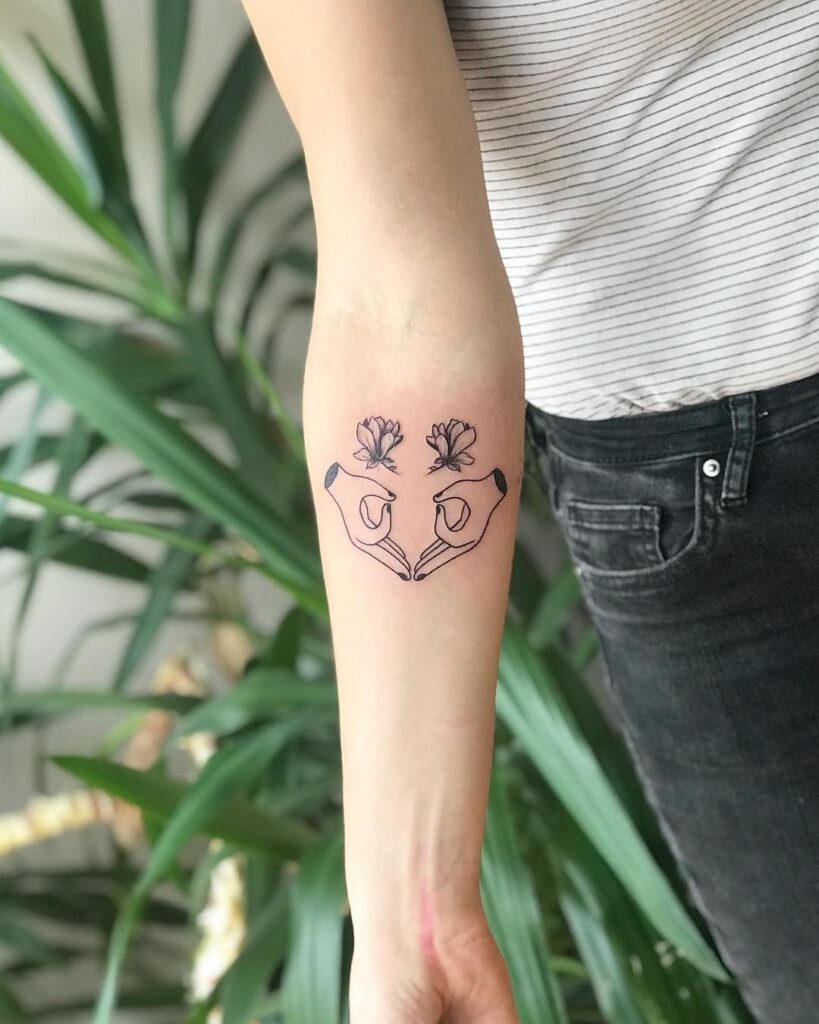 Uterus Gang Sign Tattoo