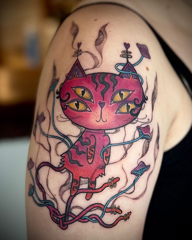 Whimsical Four-Eyed Kitty Tattoo