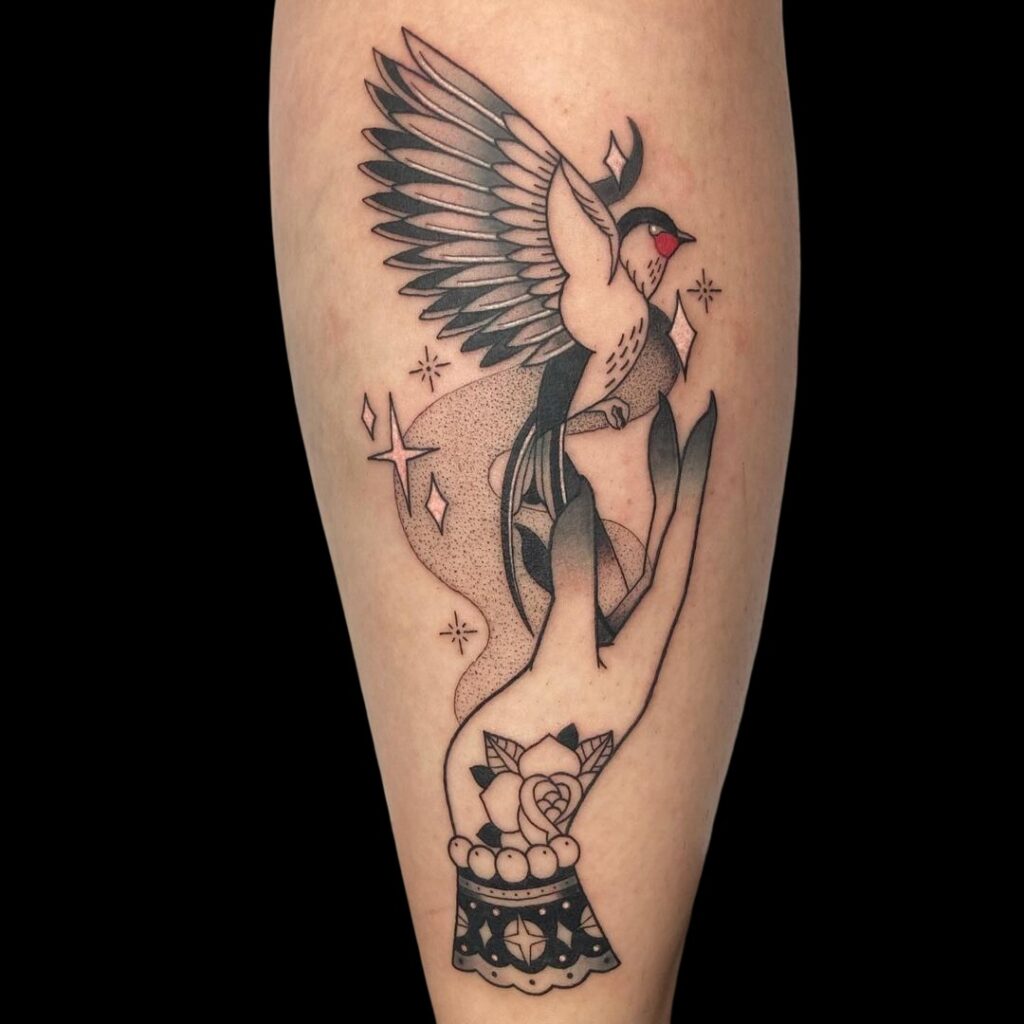 Whimsical Swallow Tattoo