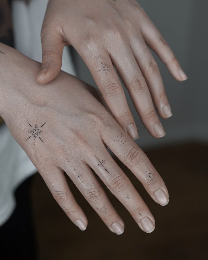 Delicate And Ornamental Hand Tattoo