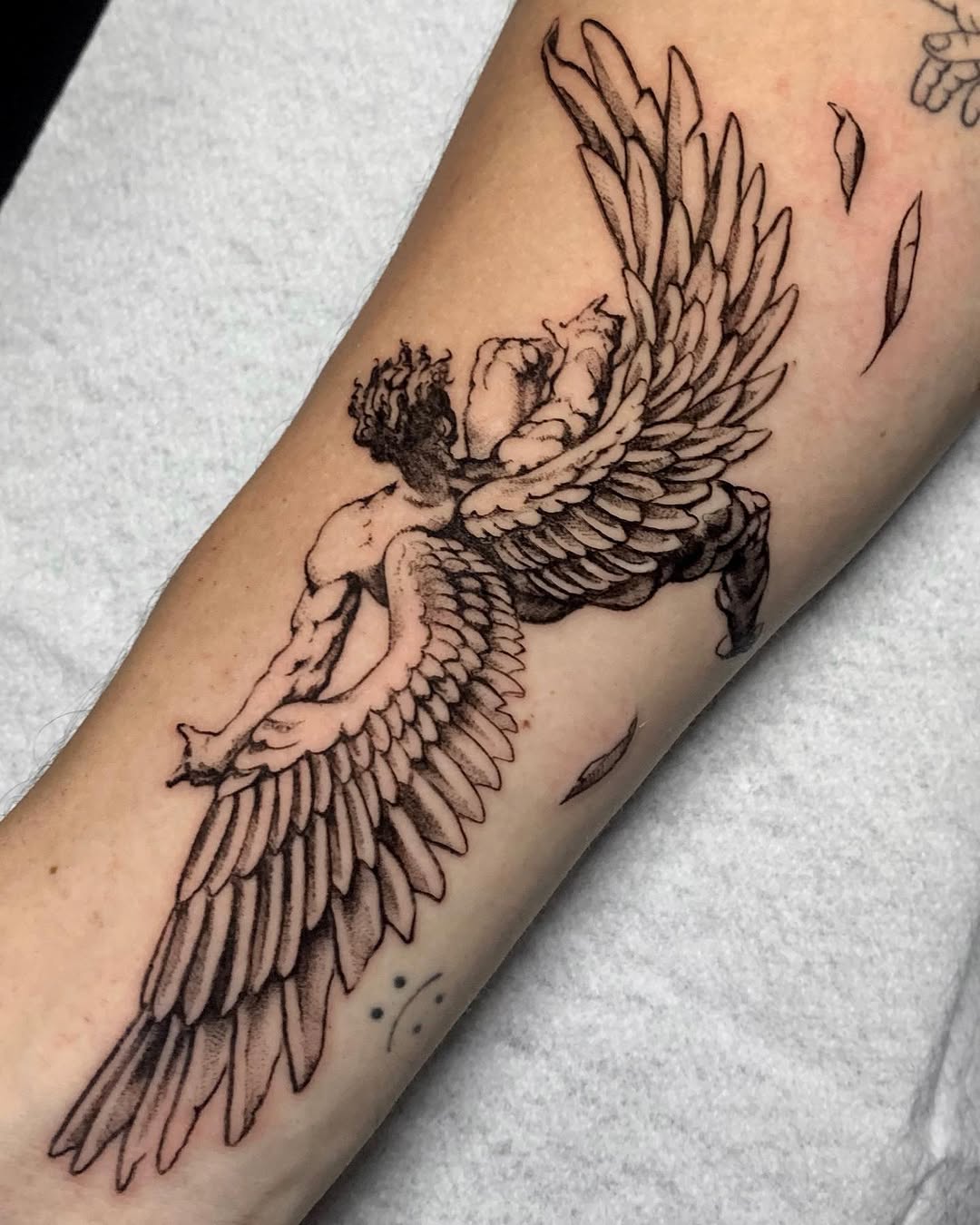 13 Divine Angel Tattoos That Represent Faith & Hope