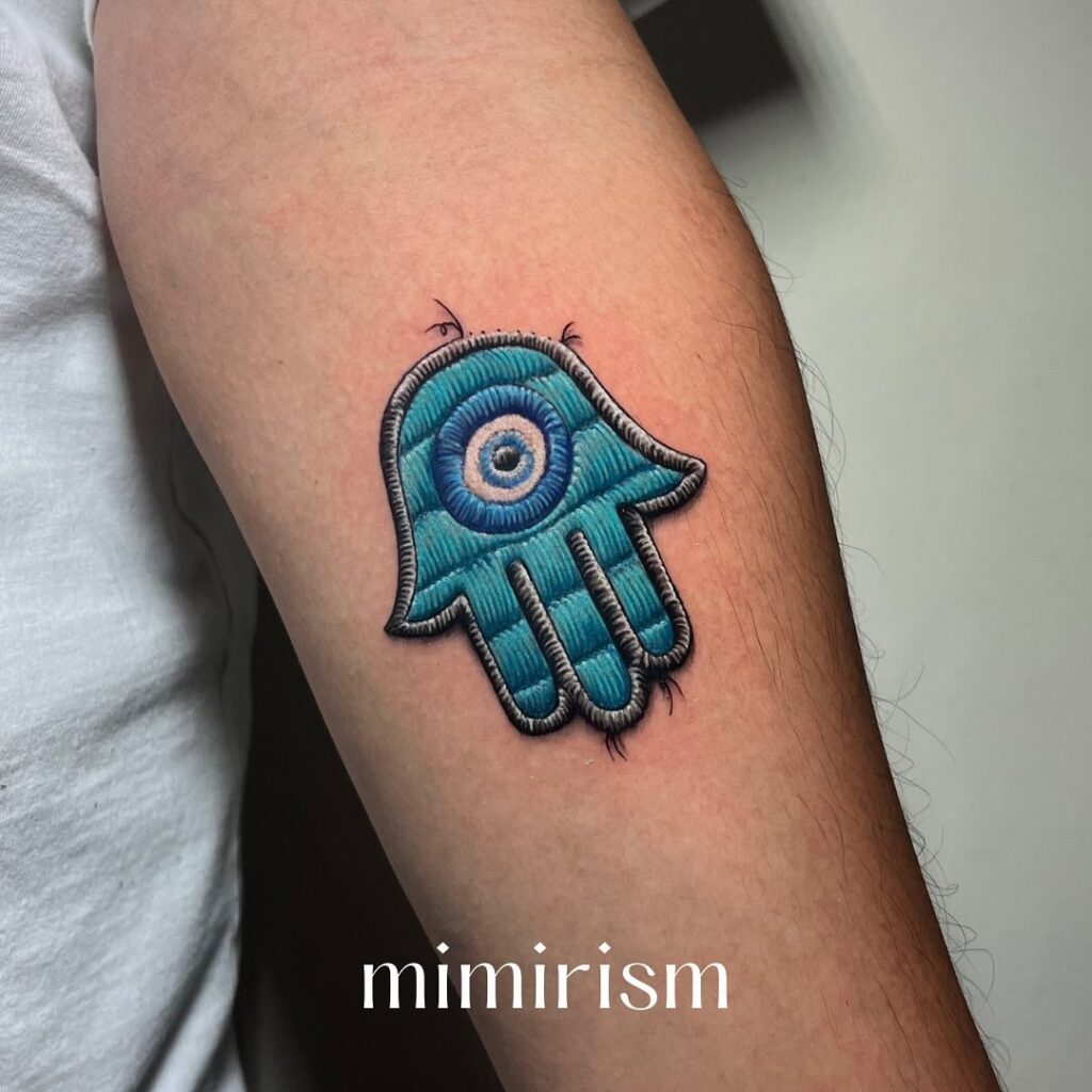 Tatuaje bordado a mano Hamsa