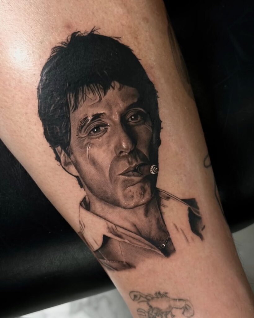 Tatuaggio con ritratto di Scarface