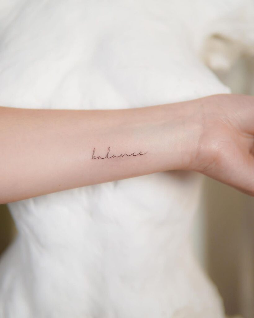  Small Word Balance Tattoo