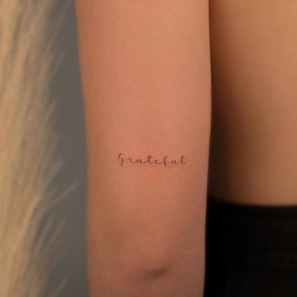 Small Word Grateful Tattoo