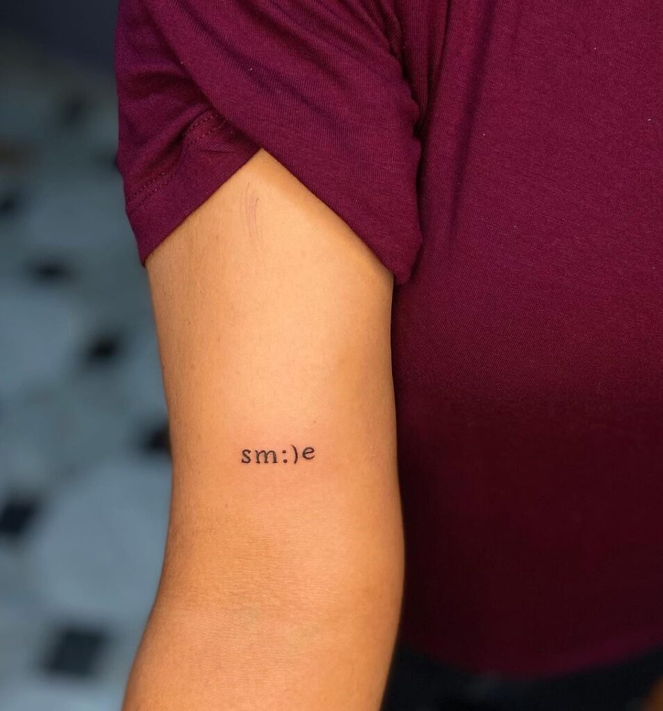 Small Word Smile Tattoo