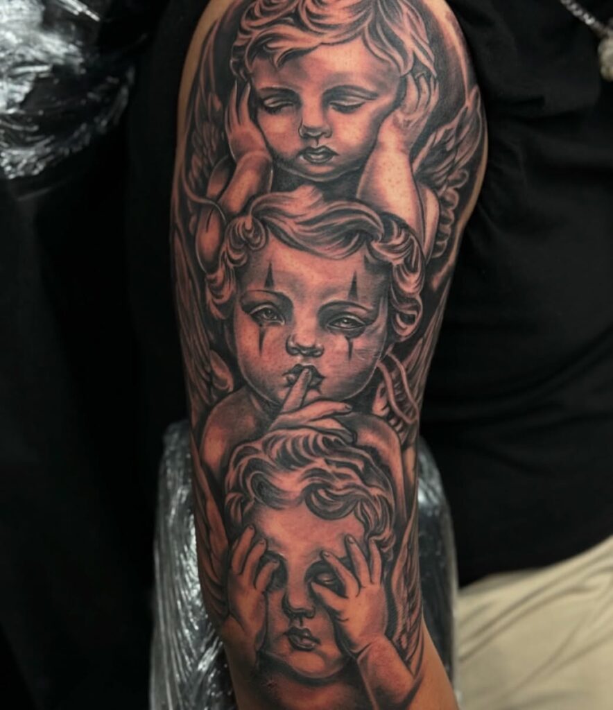 Tatuaggio con tre angeli