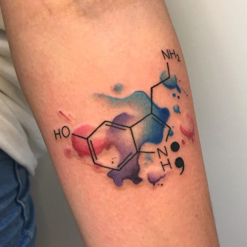 Tatuaggio con serotonina ad acquerello