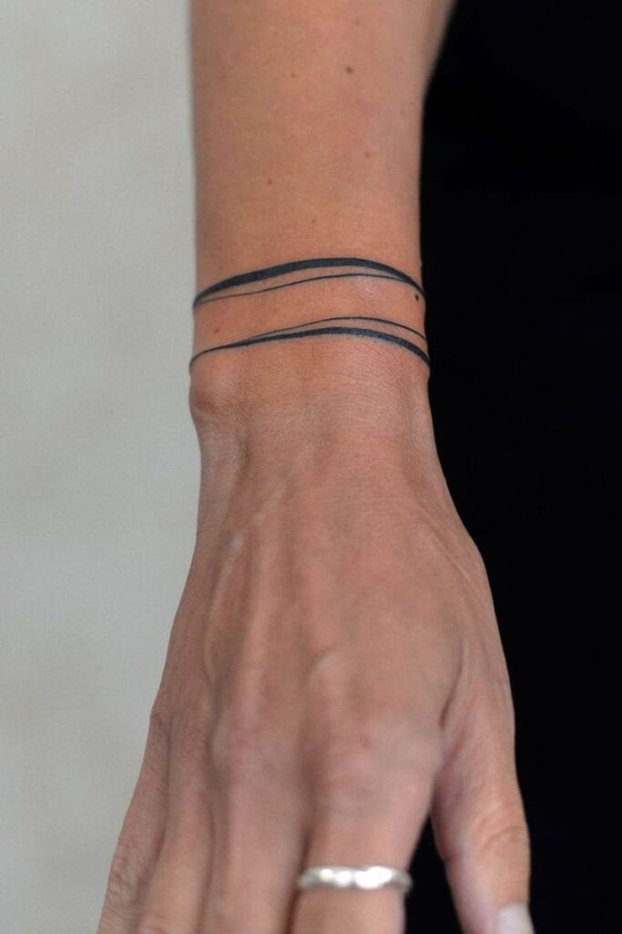 Minimalist Line Wrist Wrap Tattoo