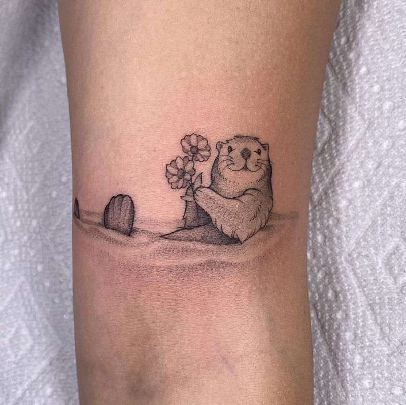 Playful Sea Otter Tattoo