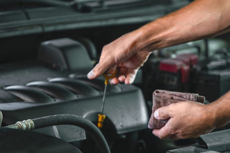 Checking the oil and tire pressure on your car