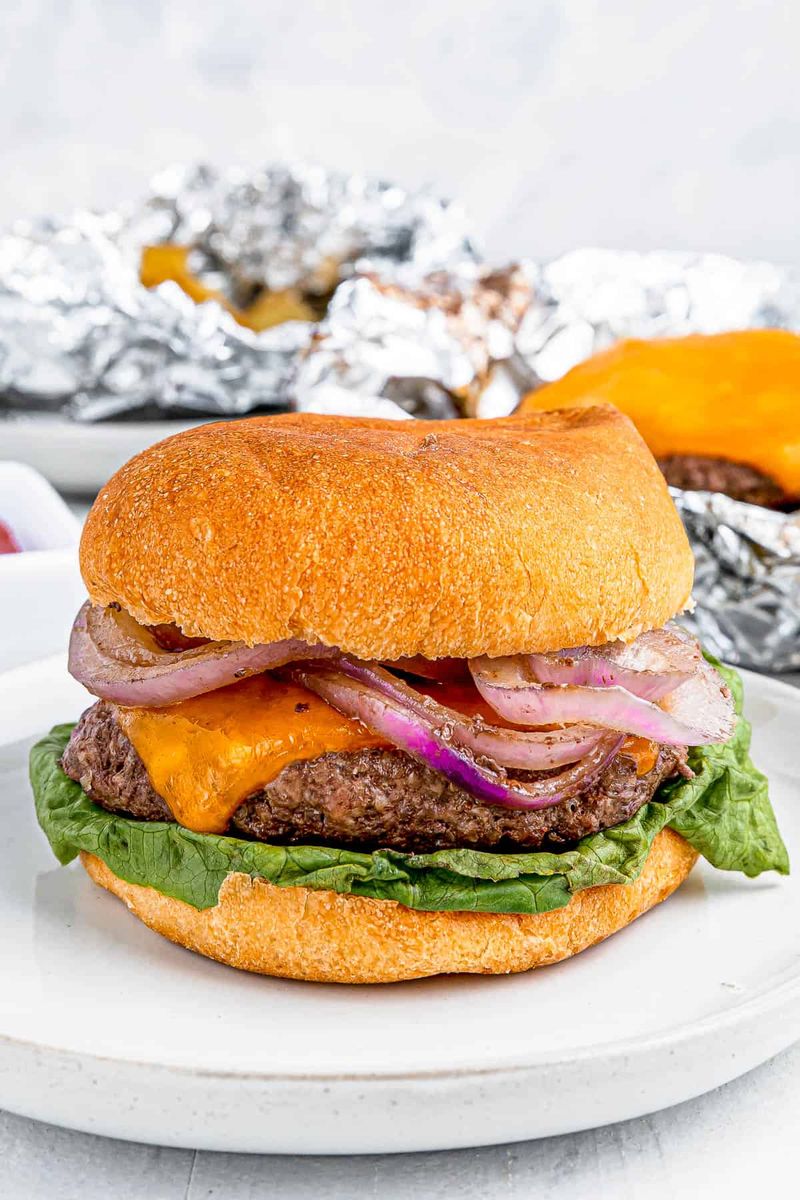 A Big Greasy Burger Wrapped in Foil