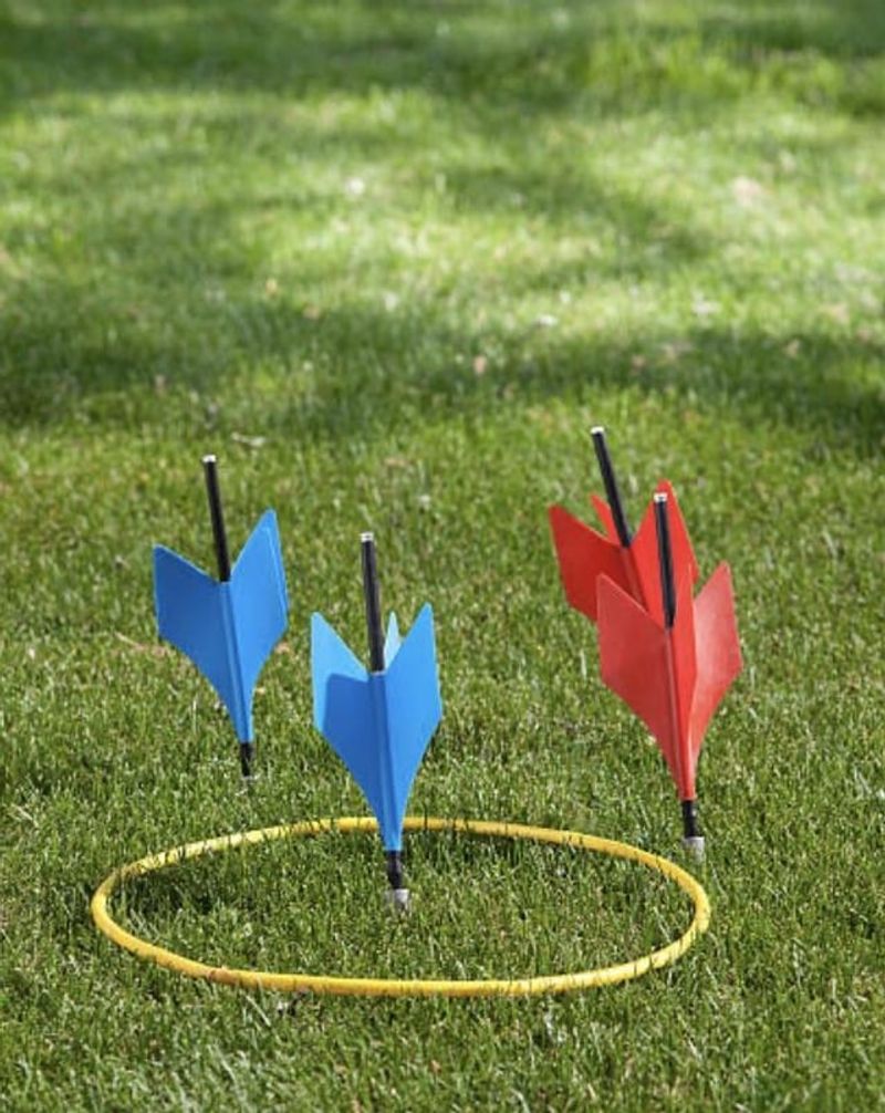 Playing lawn darts without fully understanding the danger