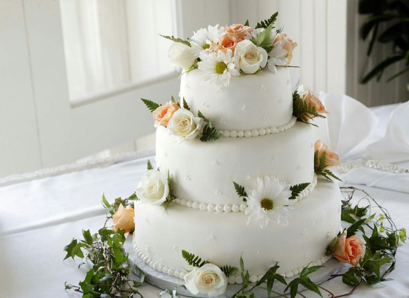 The towering white wedding cake