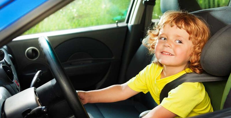 Riding in the front seat at age seven