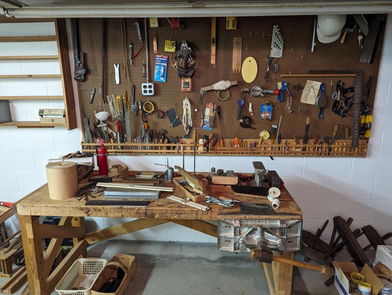 Pegboards full of rusted tools