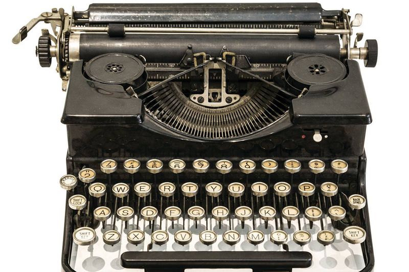 The clack and ding of a typewriter