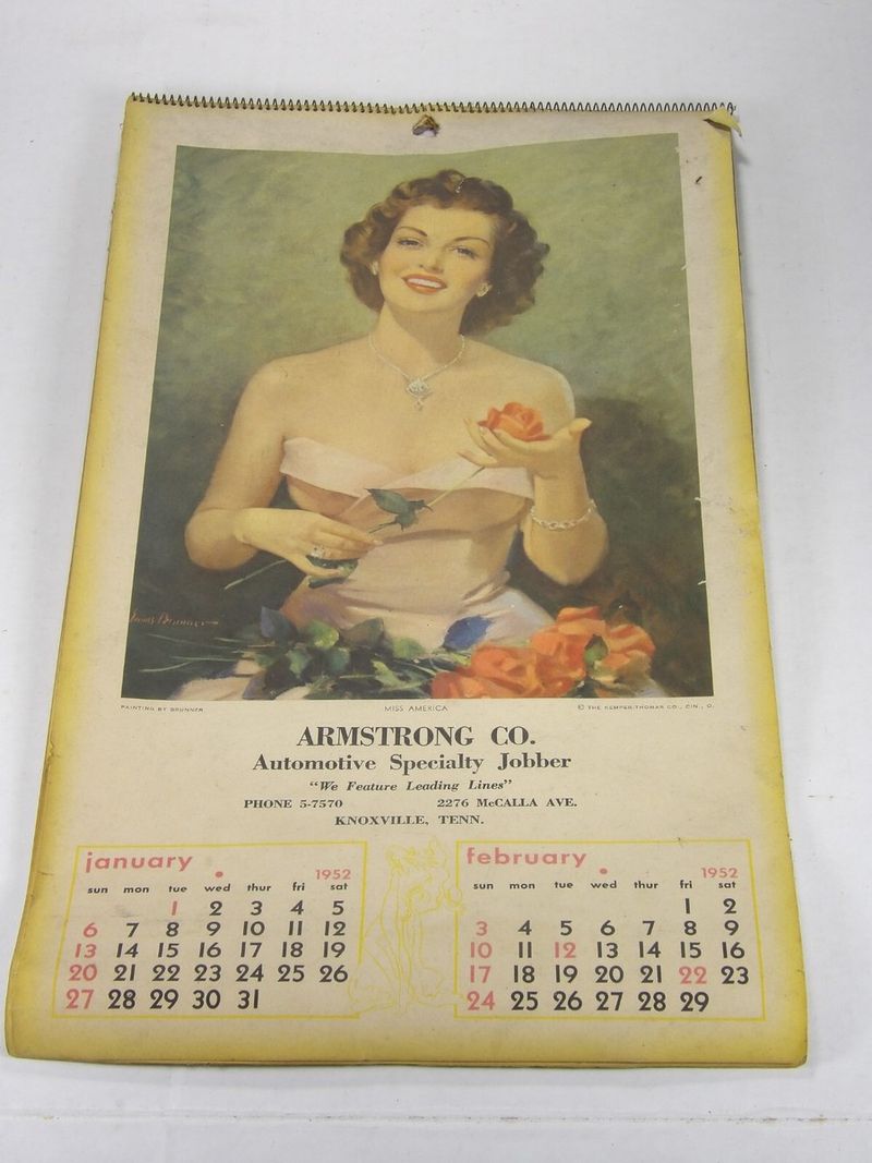 Faded pin-up calendars stuck to the cabinets