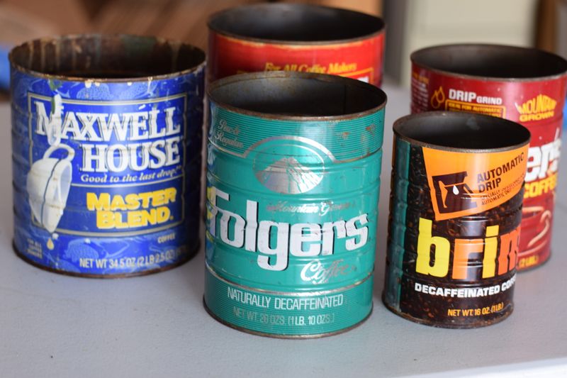 Coffee cans filled with random nails and screws