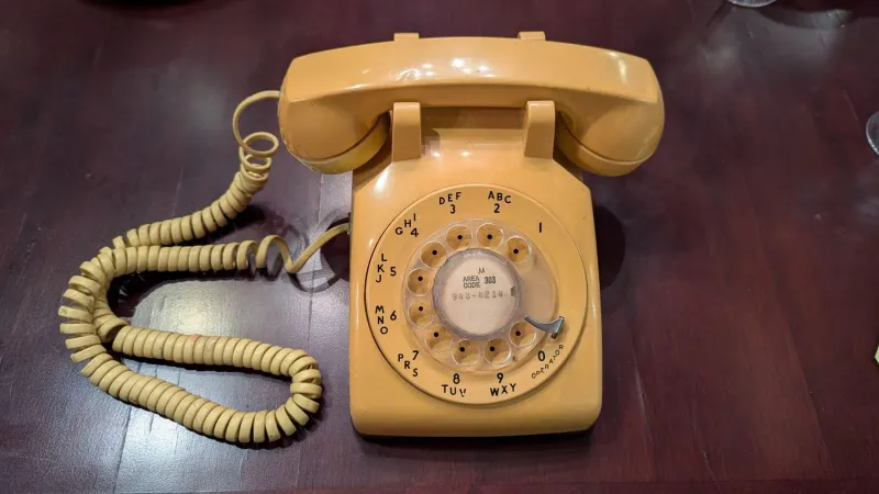 A Rotary Phone with a Long Spiral Cord