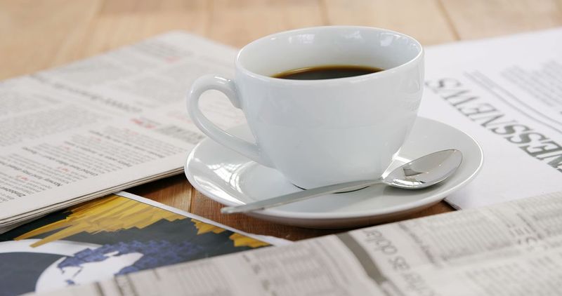 Reading the newspaper every morning