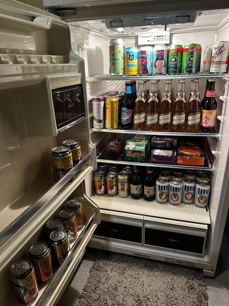 A fridge with soda—or beer from last summer