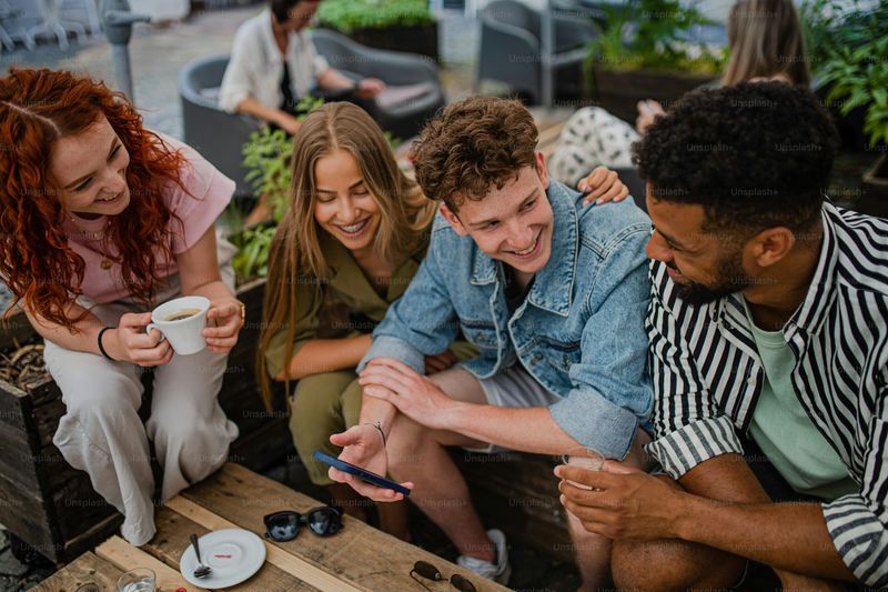 Laughing at others to bond with someone