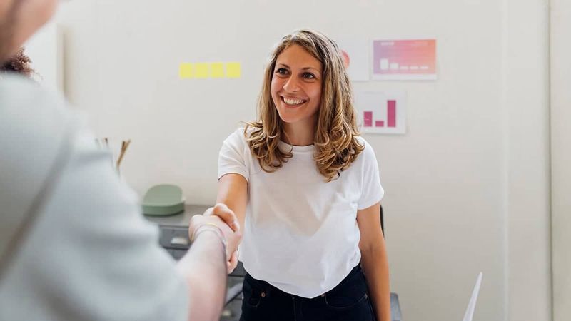 Smiling While Delivering Serious Feedback