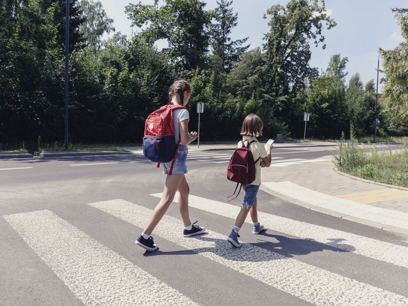 Walking to school alone—miles away