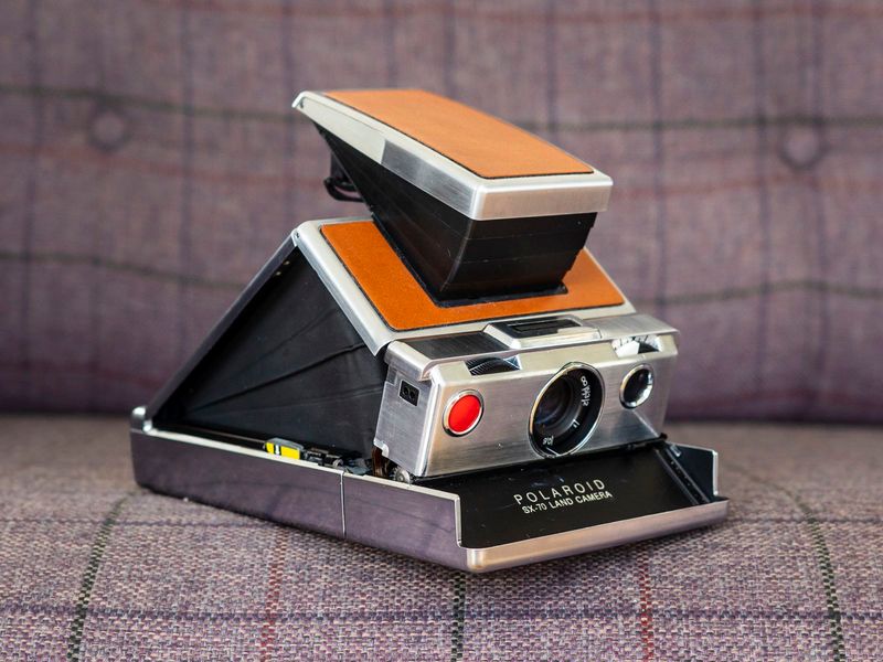 The whoosh and click of a Polaroid camera