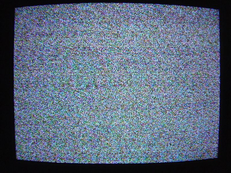 The buzz of a TV station signing off at midnight