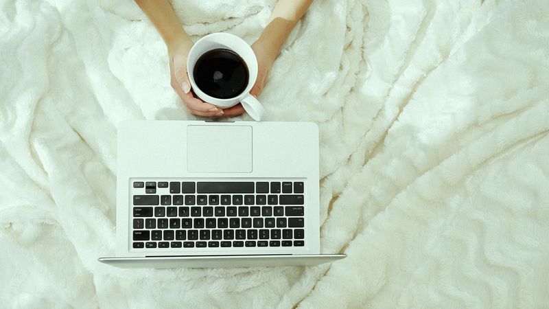 Working From Bed and Calling It “Cozy Productivity”