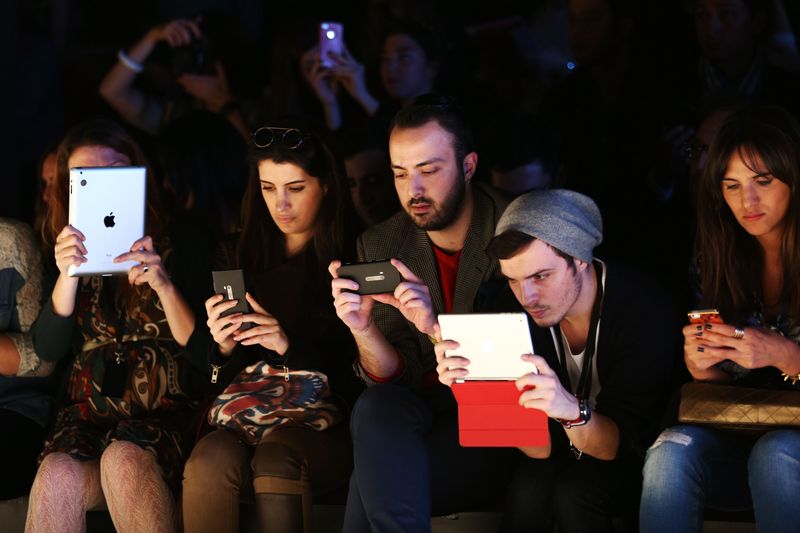 Phone Zombies in Social Settings